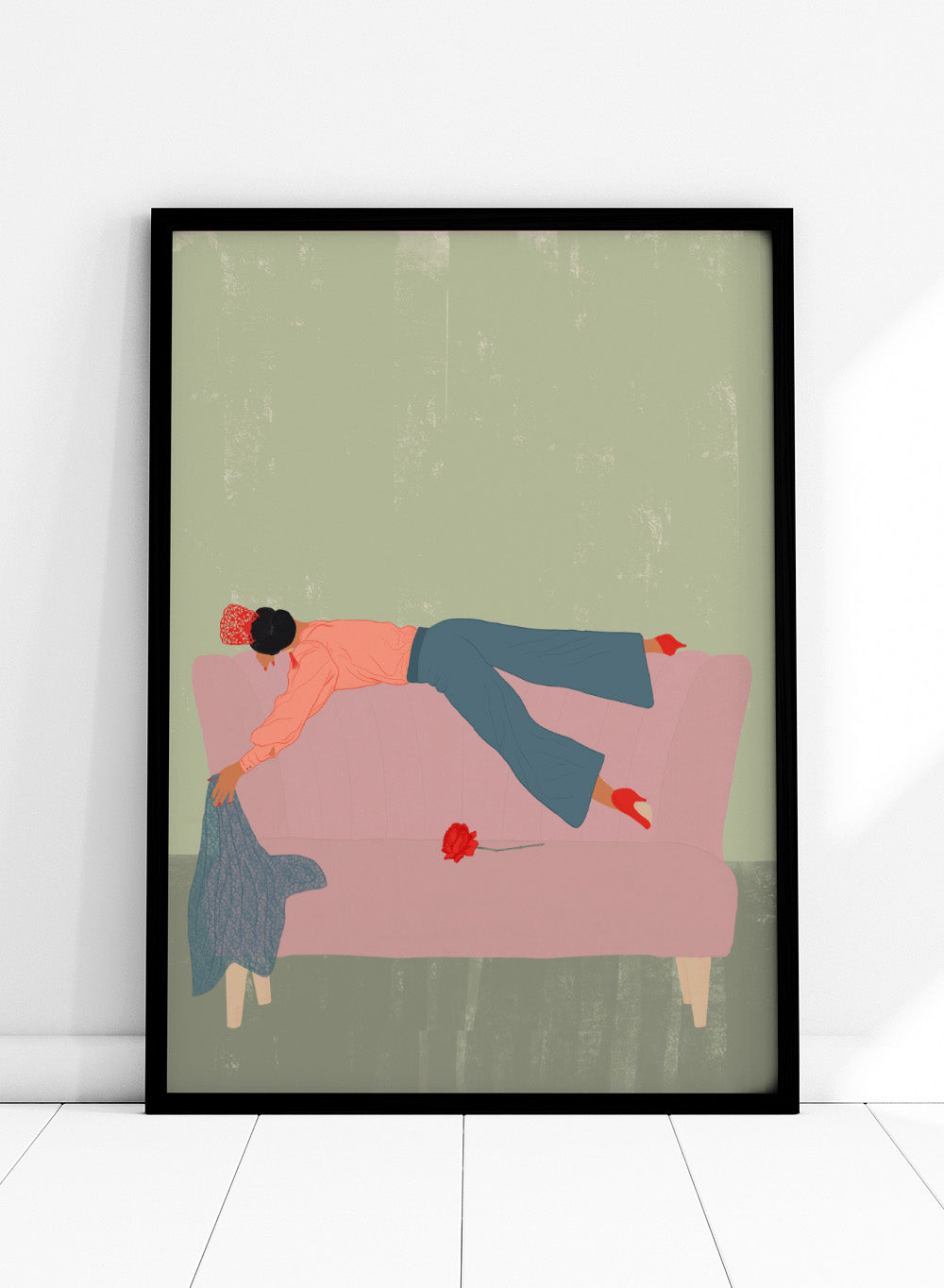 Illustration of a person lying on a pink couch with a red flower, against a green background. Rocío by Jota de Jai is a modern fine art print of a woman draped across a pink sofa with a red rose, officially licensed wall poster available framed in real wood.