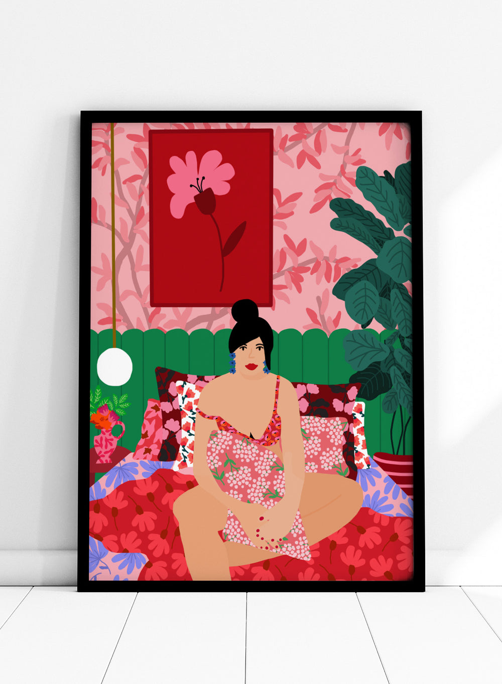 Illustration of a woman in a floral dress sitting on a bed with a colorful room setting. Floral Interior by Rafaela Mascaro is a colorful contemporary art print featuring floral patterns, lush houseplants, vibrant interiors, and joyful home decor inspiration.