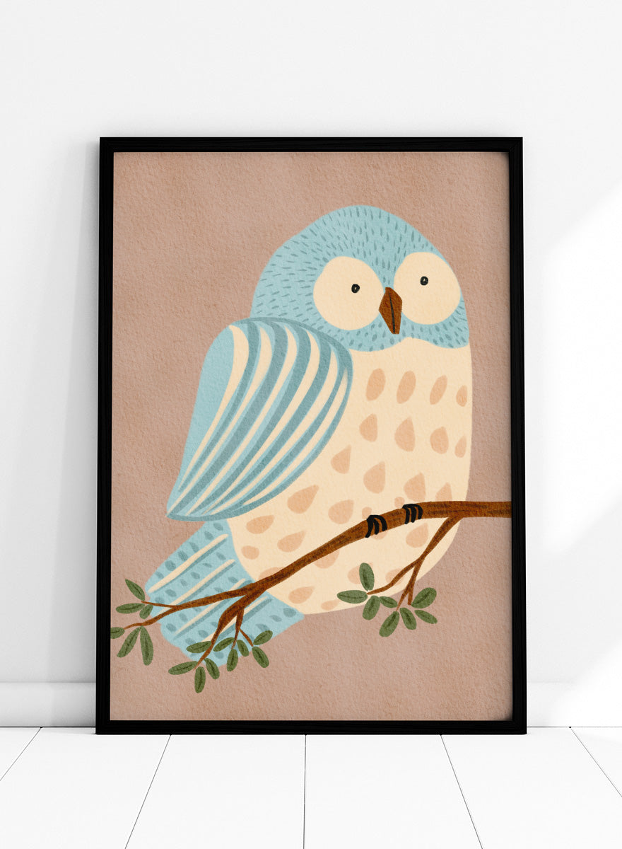 A stylized illustration of a blue and cream owl perched on a brown branch with green leaves, set against a warm beige background. Shop Whimsical Blue Owl by Nikita Jariwala, a blue owl wall art print poster for nursery and kids room decor featuring a playful bird illustration and soft blue tones.