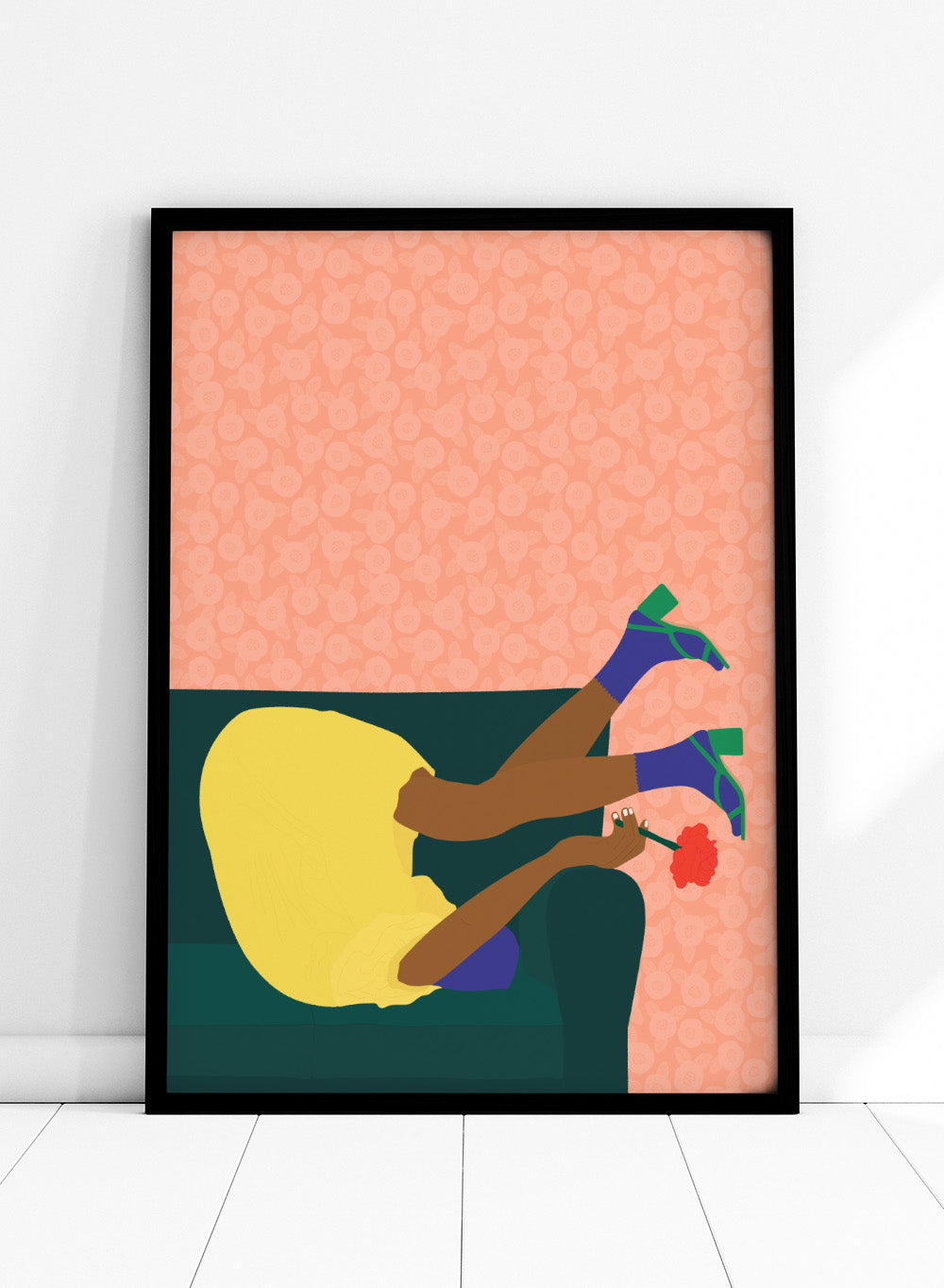 Illustration of a person sitting on a couch with a flower, against a patterned pink background. New Year’s Eve by Jota De Jai is a playful modern fine art print of a woman upside down on a couch in heels and a yellow dress. Available framed or unframed.