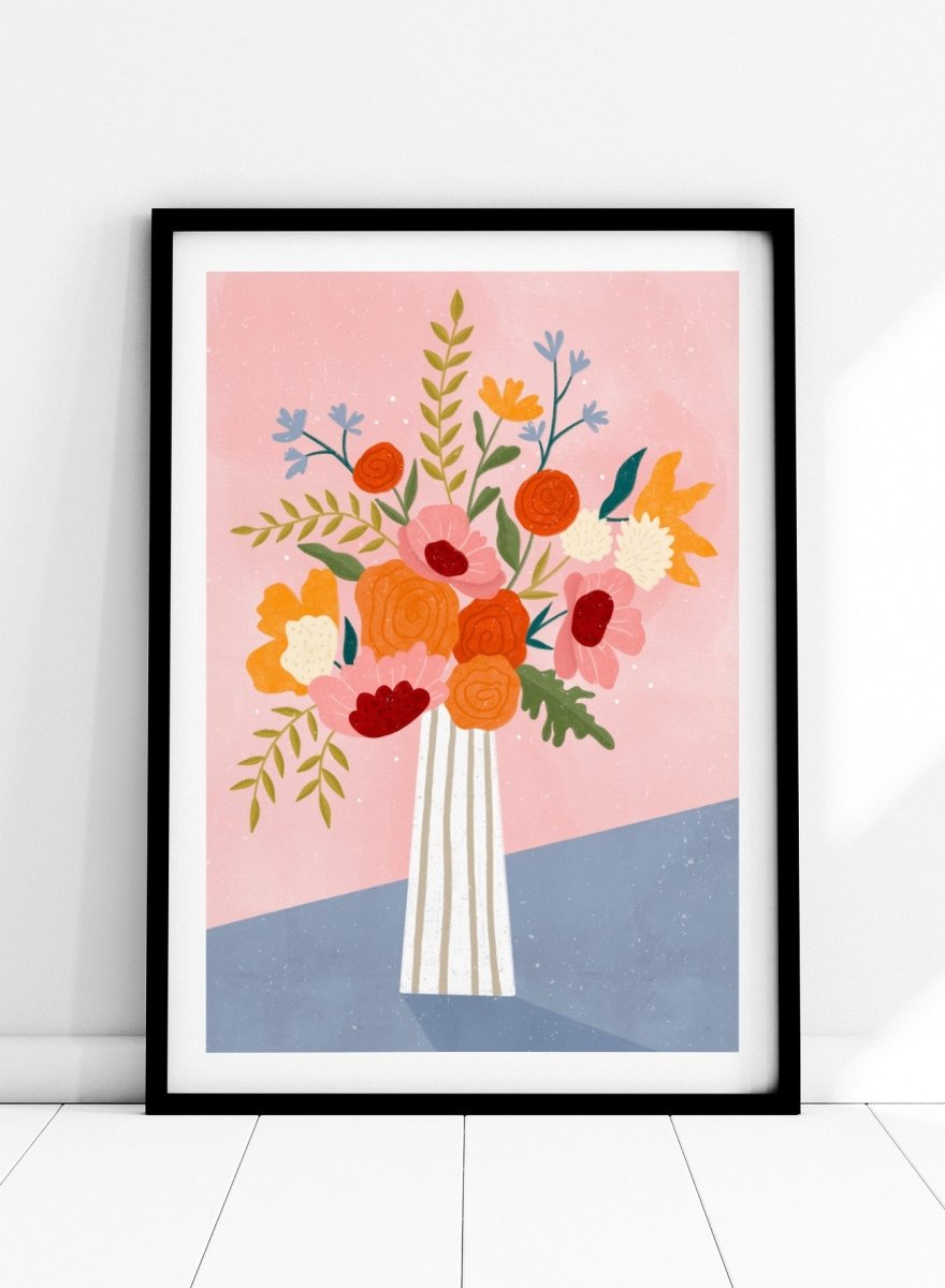 A framed art print featuring a colorful, stylized illustration of a flower bouquet in a striped vase against a pink and blue background. Modern Floral Arrangement by Bea Müller premium framed fine art print featuring a colorful bouquet in a striped vase on a soft pink background.