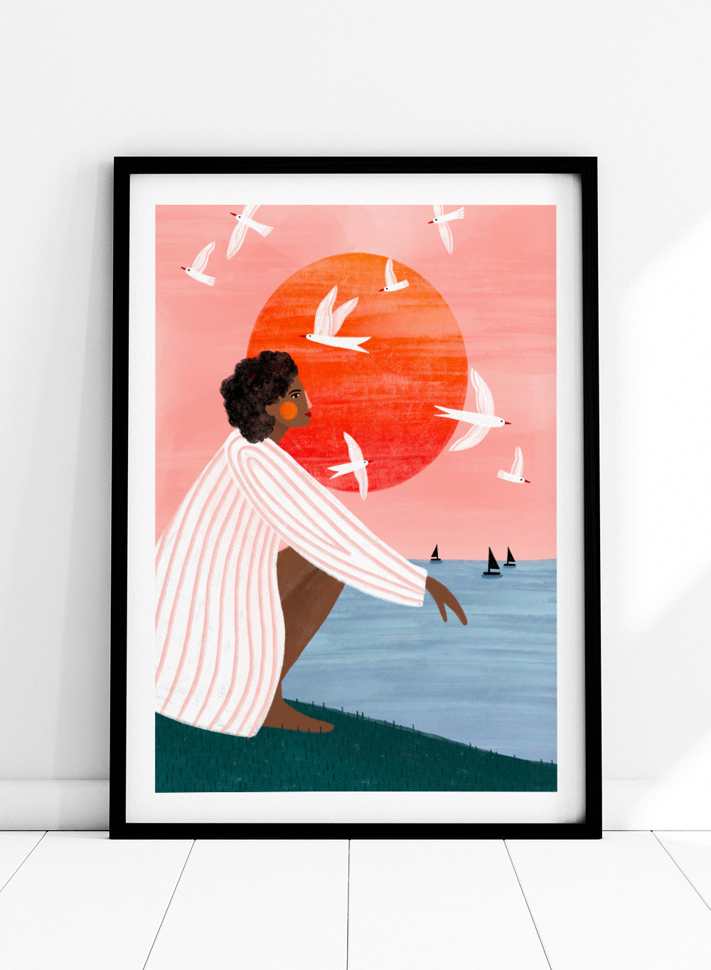 Sunset On My Own by Bea Müller is an officially licensed art print featuring a modern illustrated woman, ocean view, and warm sunset tones. Available framed or unframed.