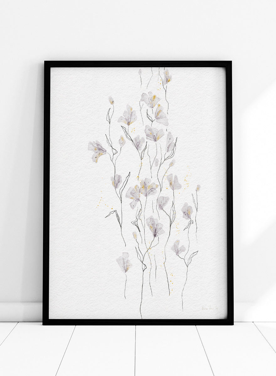 A framed watercolor painting of delicate white and light gray flowers with thin stems on a textured white background. Shop Delicate Gold Flowers by Ankie Kooi, a floral wall art print poster with airy botanical stems, soft gray flowers, yellow accents, and line art.