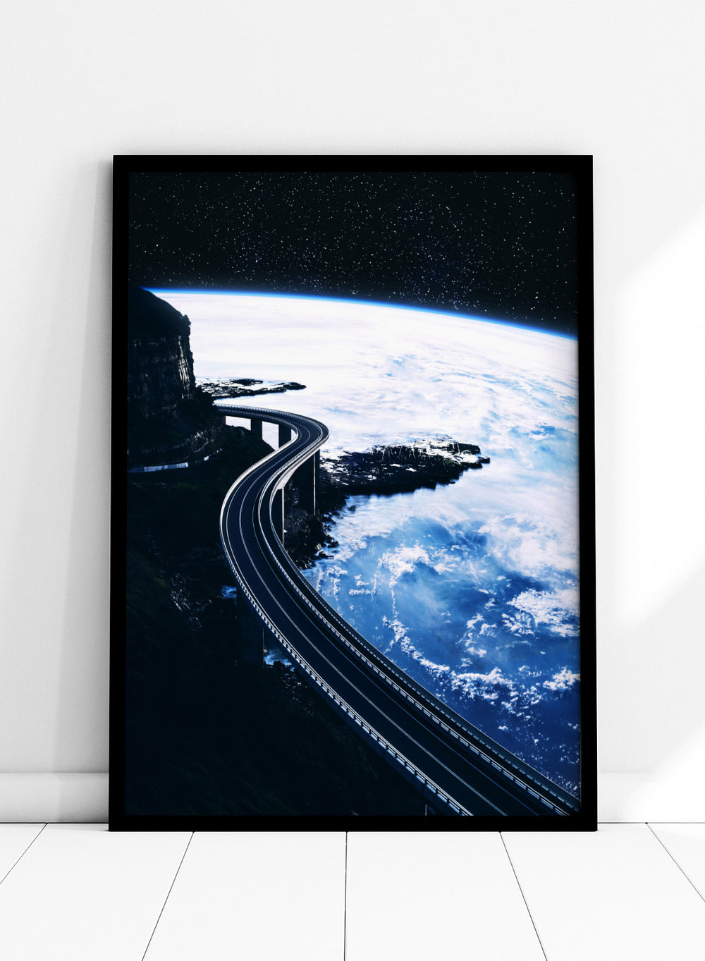 Artistic depiction of a road curving around the Earth with a starry night sky. Road To Infinity by Taudalpoi surreal space highway art print with winding road above Earth and starry sky, retro cosmic collage poster wall art.