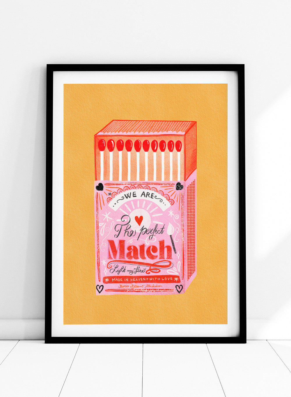 Illustration of a matchbox with 'We are the perfect match' text on a yellow background. Match Box, The Perfect Match by Baroo Bloom is a playful love-themed art print featuring a pink illustrated matchbox. Officially licensed wall poster with optional framing.