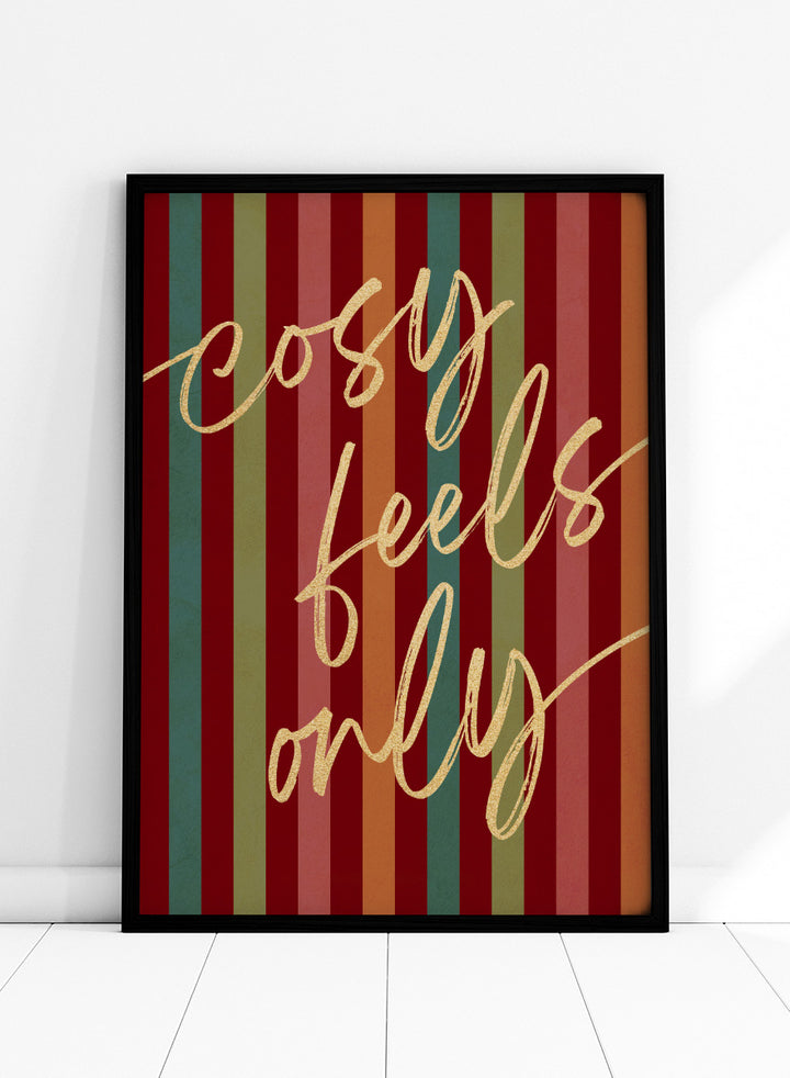 Shop Cosy Feels Christmas by Dominique Vari, a colorful holiday wall art print poster featuring retro stripes, gold lettering, and festive red and green tones.