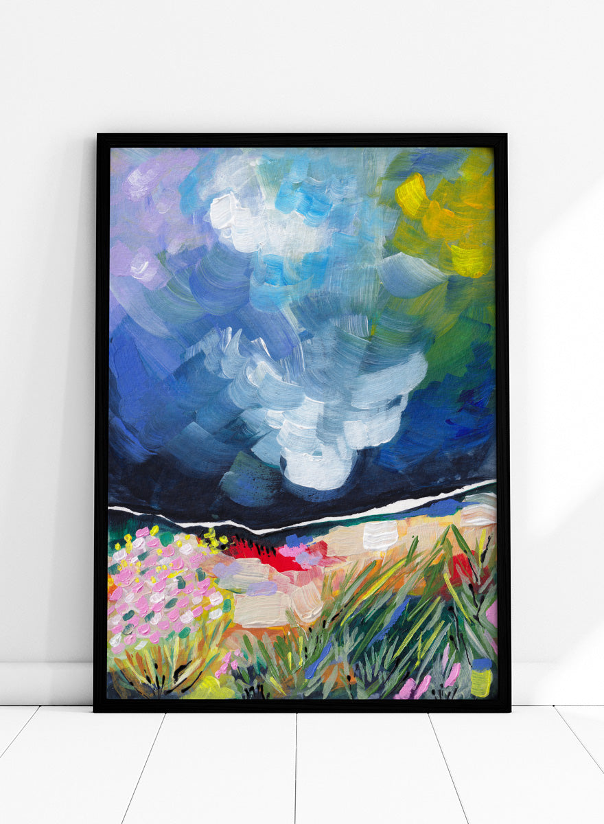 An expressive landscape painting featuring a dark blue stormy sky with swirling brushstrokes and a foreground of green grasses, pink flowers, and yellow-green foliage. Shop Vibrant Abstract Field Sky by Dirkie Nell, a colorful abstract landscape art print featuring wildflowers, open fields, and a dramatic blue sky.