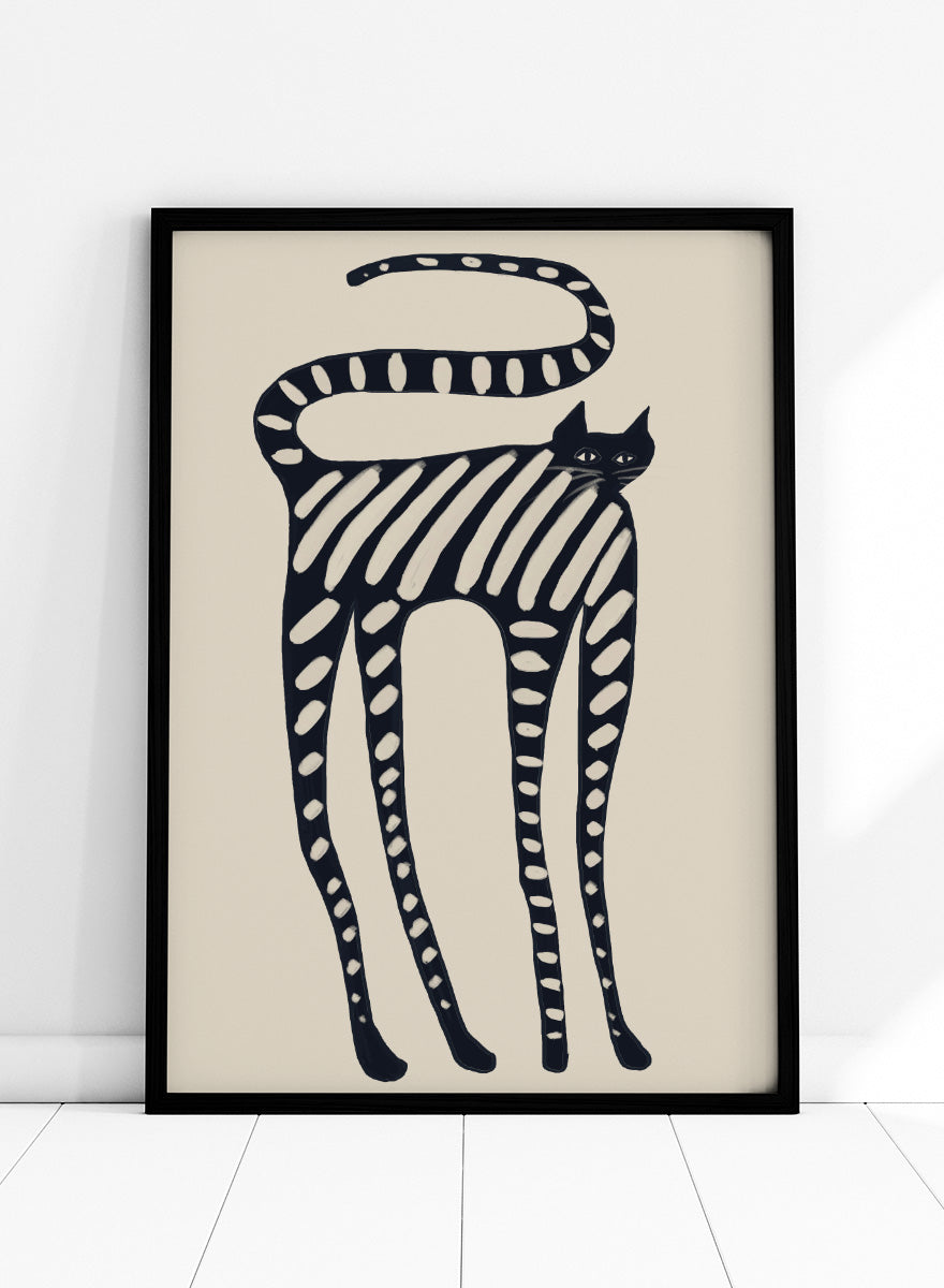 A stylized black cat illustration with bold diagonal stripes and white oval spots on a warm beige background. Striped Whimsical Cat by The Art Concept playful cat art print featuring an elongated black cat with cream stripes and an oversized looping tail.