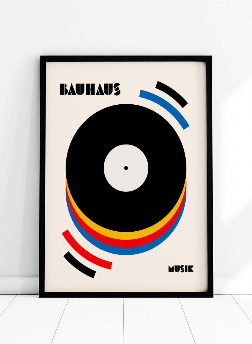 A Bauhaus-style poster featuring a large black vinyl record graphic with concentric red, yellow, and blue rings on a warm cream background, with the words &