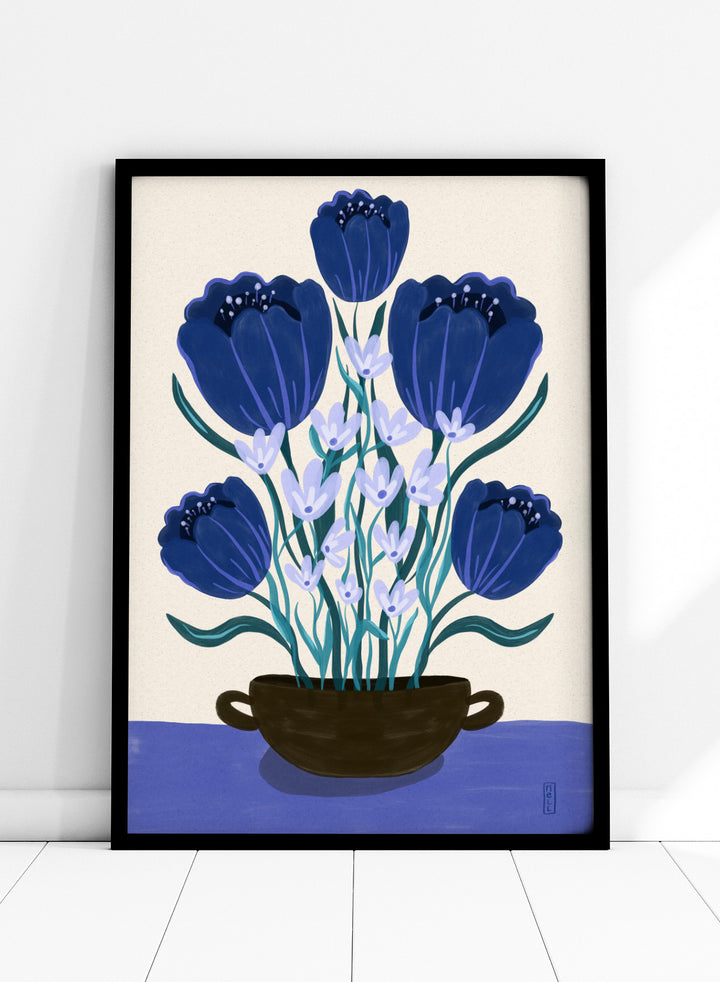 Artistic depiction of blue flowers in a black pot on a beige background. Blue Floral Arrangement by Dirkie Nell is a botanical floral art print featuring deep blue flowers, folk inspired illustration, modern wall art, and expressive hand painted details.