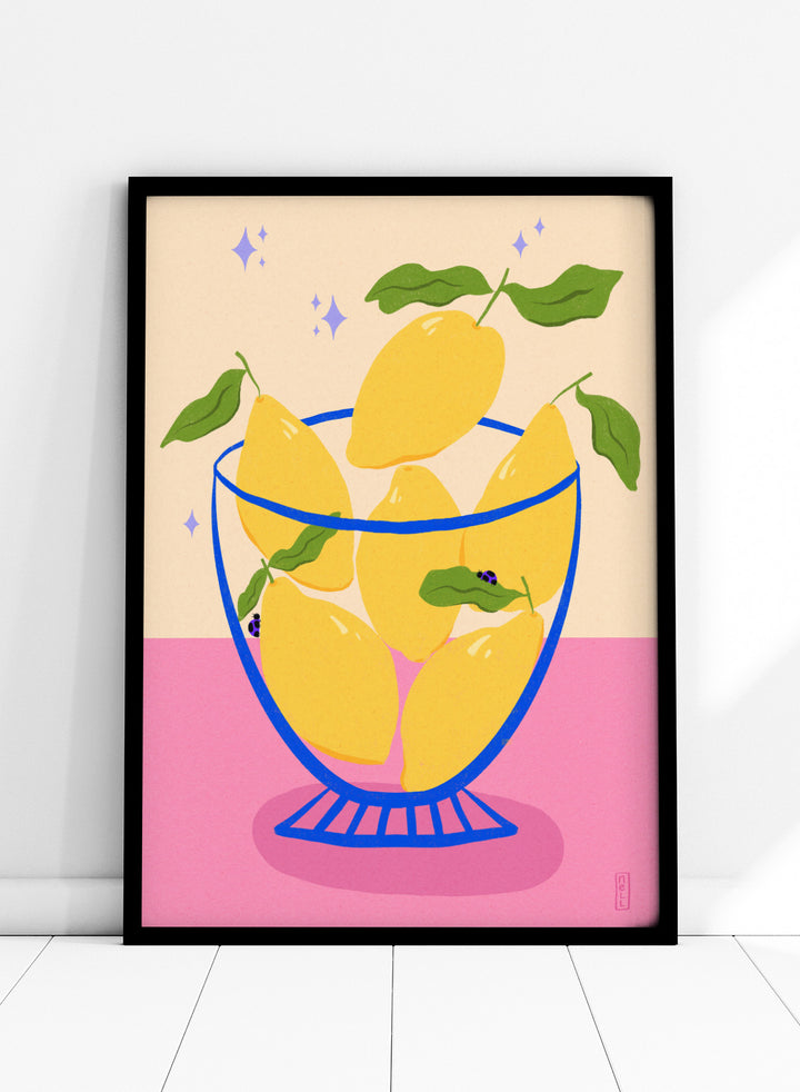 Illustration of lemons in a glass bowl with green leaves on a pink and beige background. Blue Floral Arrangement by Dirkie Nell is a botanical floral art print featuring deep blue flowers, folk inspired illustration, modern wall art, and expressive hand painted details.