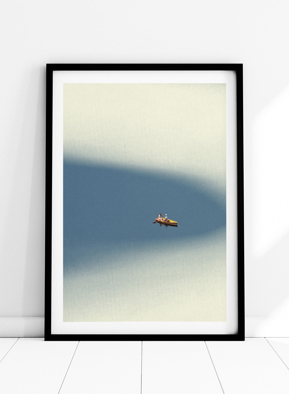 Happy Memories by Maarten Léon is an officially licensed art print featuring a minimalist boat scene with soft blue tones and open water. Available as a premium fine art print with optional real wood framing.
