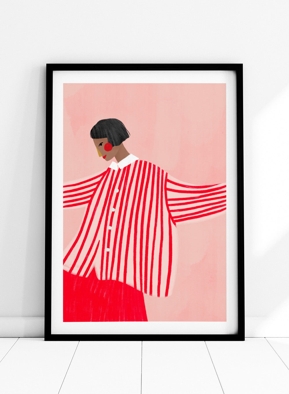 The Woman With the Red Stripes by Bea Müller is an officially licensed art print featuring bold red patterns and a modern illustrated woman. Available framed or unframed.