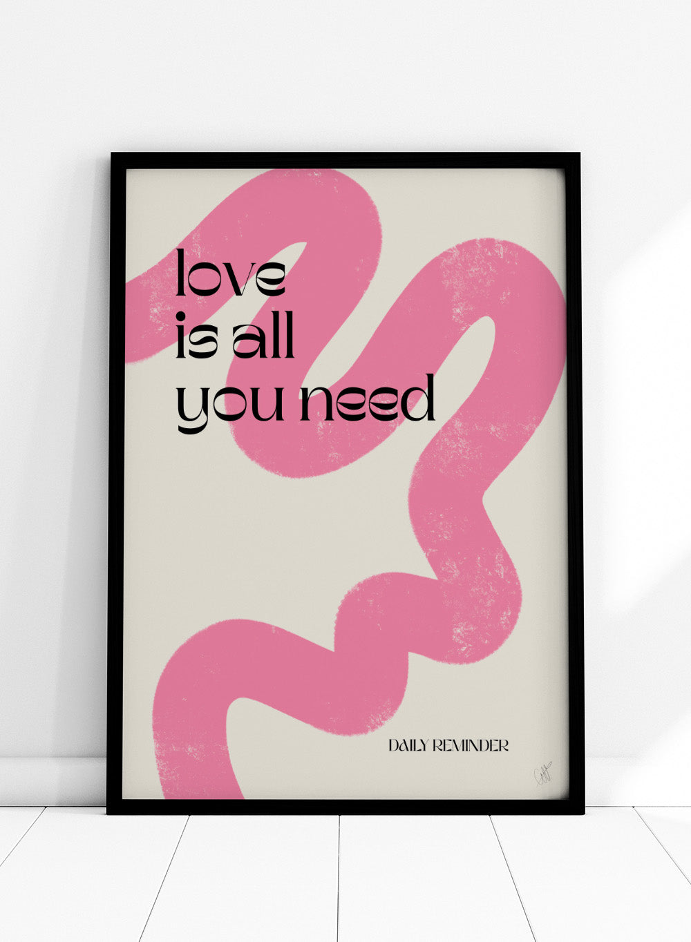 Poster with pink abstract design and 'love is all you need' text on a light background. Love Is All You Need by Anne-Marie Volfova is a typography art print with bold lettering and pink abstract brushstrokes. A modern love wall poster.