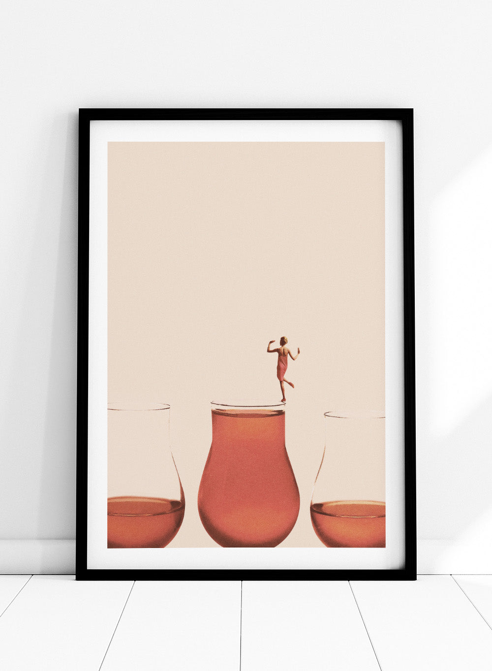 I Prefer the Full One by Maarten Léon collage art print featuring a woman standing on a full glass. Premium fine art print with real wood framing.