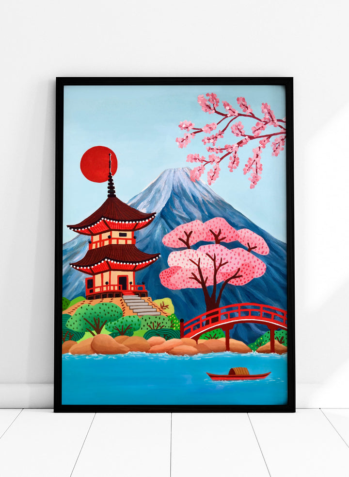 A colorful Japanese-style landscape artwork showing a red pagoda beside a red bridge over blue water, with pink cherry blossoms, a mountain, and a red sun in the sky. Shop Japanese Pagoda Spring Landscape by Nidhi Kachhadiya, a colorful Japan travel wall art print featuring Mount Fuji, cherry blossoms, a red pagoda, and spring scenery.