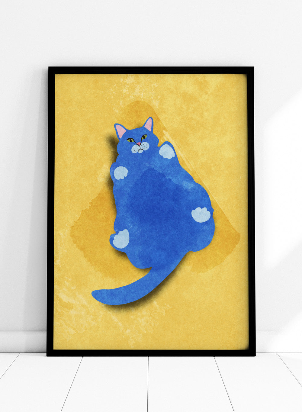 Blue cat illustration on a yellow textured background. Fat Cat by Raissa Oltmanns is a modern cat art print featuring a bold blue feline on yellow background in contemporary wall poster style.