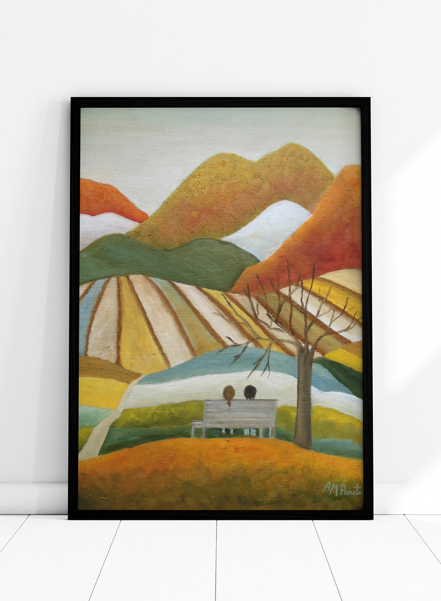 A stylized landscape painting with layered mountains, terraced fields, a bare tree, and two small figures seated on a bench in the foreground. Shop Couple On Autumn Bench by Angeles M. Pomata, an autumn landscape and figurative art print featuring a seated couple, rolling hills, patchwork fields, and warm fall tones.