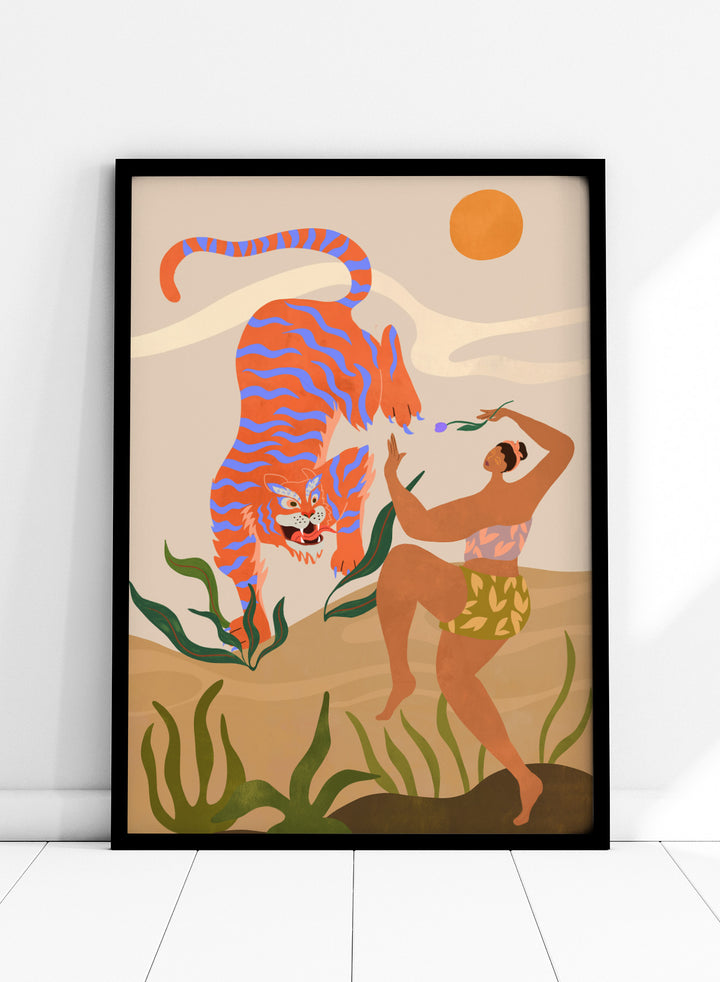 Illustration of a tiger and a person in a natural setting with plants and a sun. Dance with Me by Arty Guava is a colorful contemporary art print featuring a dancing woman, playful tiger, tropical motifs, and whimsical modern illustration.