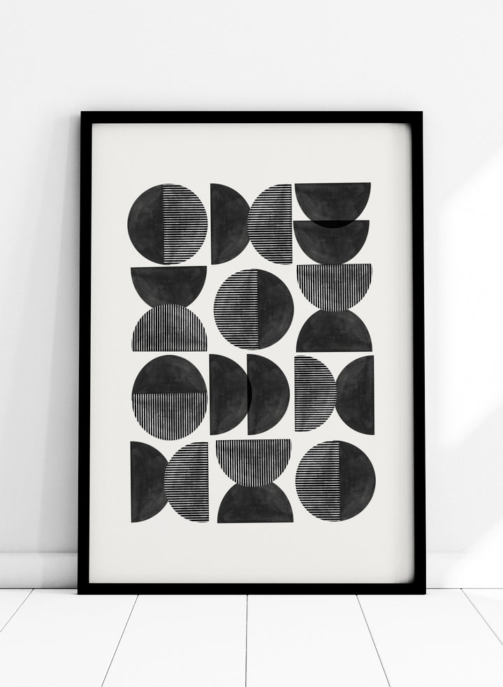 Geometric pattern of black semi-circles on a white background. Geometric Rhythm by The MIUUS Studio is a minimalist abstract art print and wall poster featuring repeating geometric shapes, black and white tones, and modern striped textures.