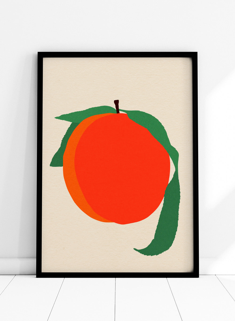 Illustration of a peach with green leaves on a beige background. Peach by Rosi Feist is a modern minimalist fruit art print with bold color and Bauhaus-inspired graphic design. Officially licensed fine art poster with framing.