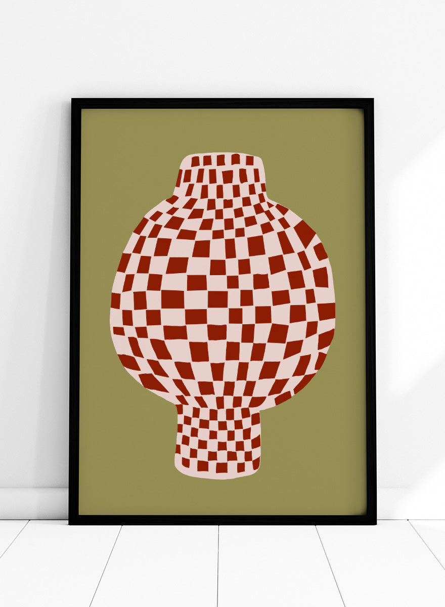 A stylized graphic print of a vase with a red and off-white checkerboard pattern, set against an olive green background. Retro Checkered Vase by The Art Concept is a modern still life art print featuring a red checkered vase, olive green background, and playful retro style.