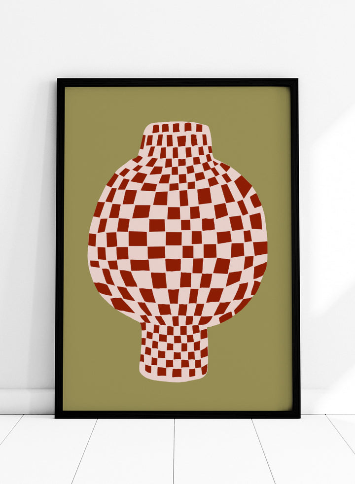 A stylized graphic print of a vase with a red and off-white checkerboard pattern, set against an olive green background. Retro Checkered Vase by The Art Concept is a modern still life art print featuring a red checkered vase, olive green background, and playful retro style.