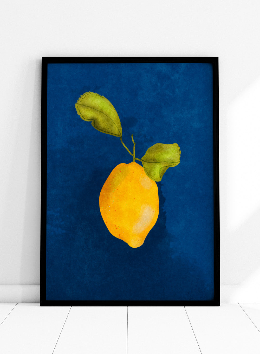 Just a Little Lemon by Raissa Oltmanns is a modern lemon art print featuring a bold yellow citrus still life on deep blue wall poster design.