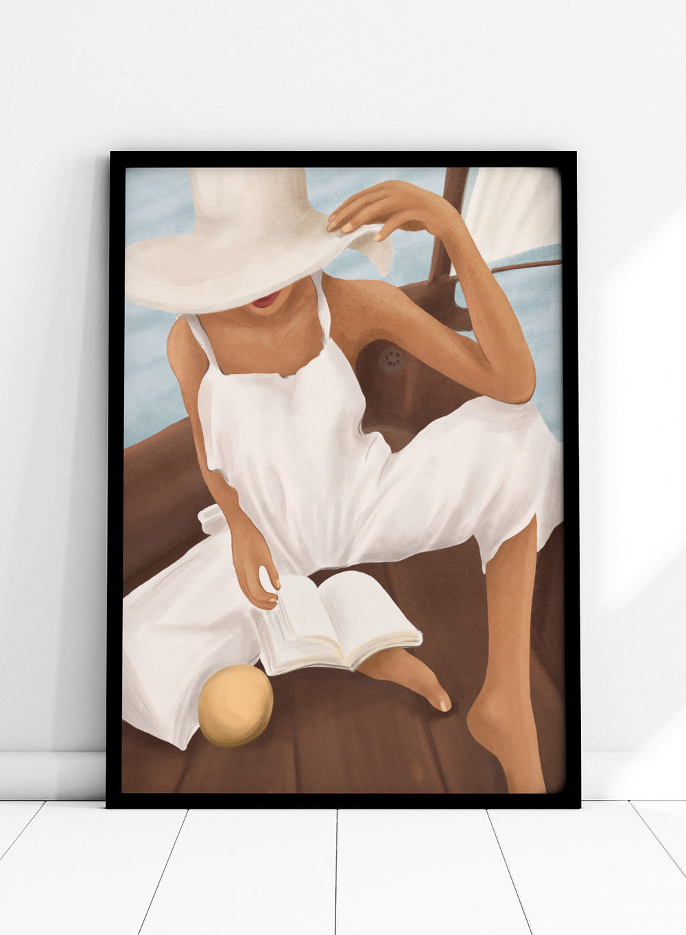 Woman in a white dress and hat reading a book on a boat. Summer Boat Reading by City Art is a modern coastal art print featuring a woman reading on a boat in a white dress, surrounded by blue water and warm wood.