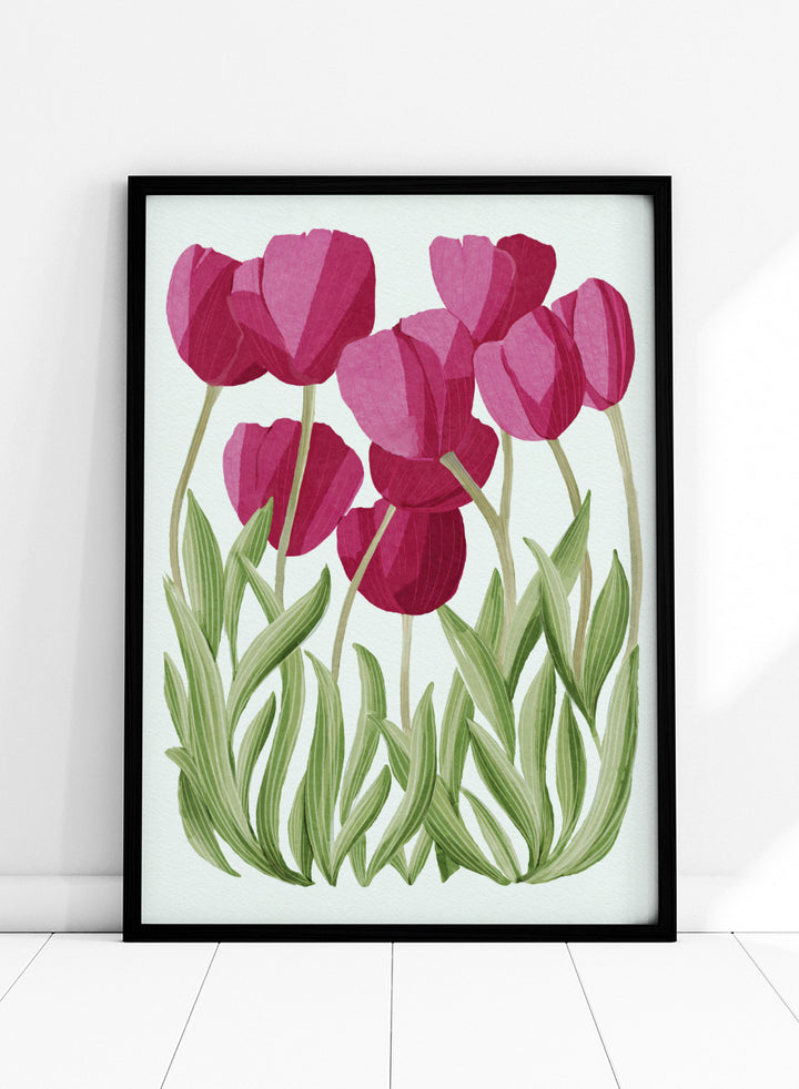 A stylized floral illustration of pink tulips with green leaves on a white background. Shop Tulips Floral Art Print by Katie O&