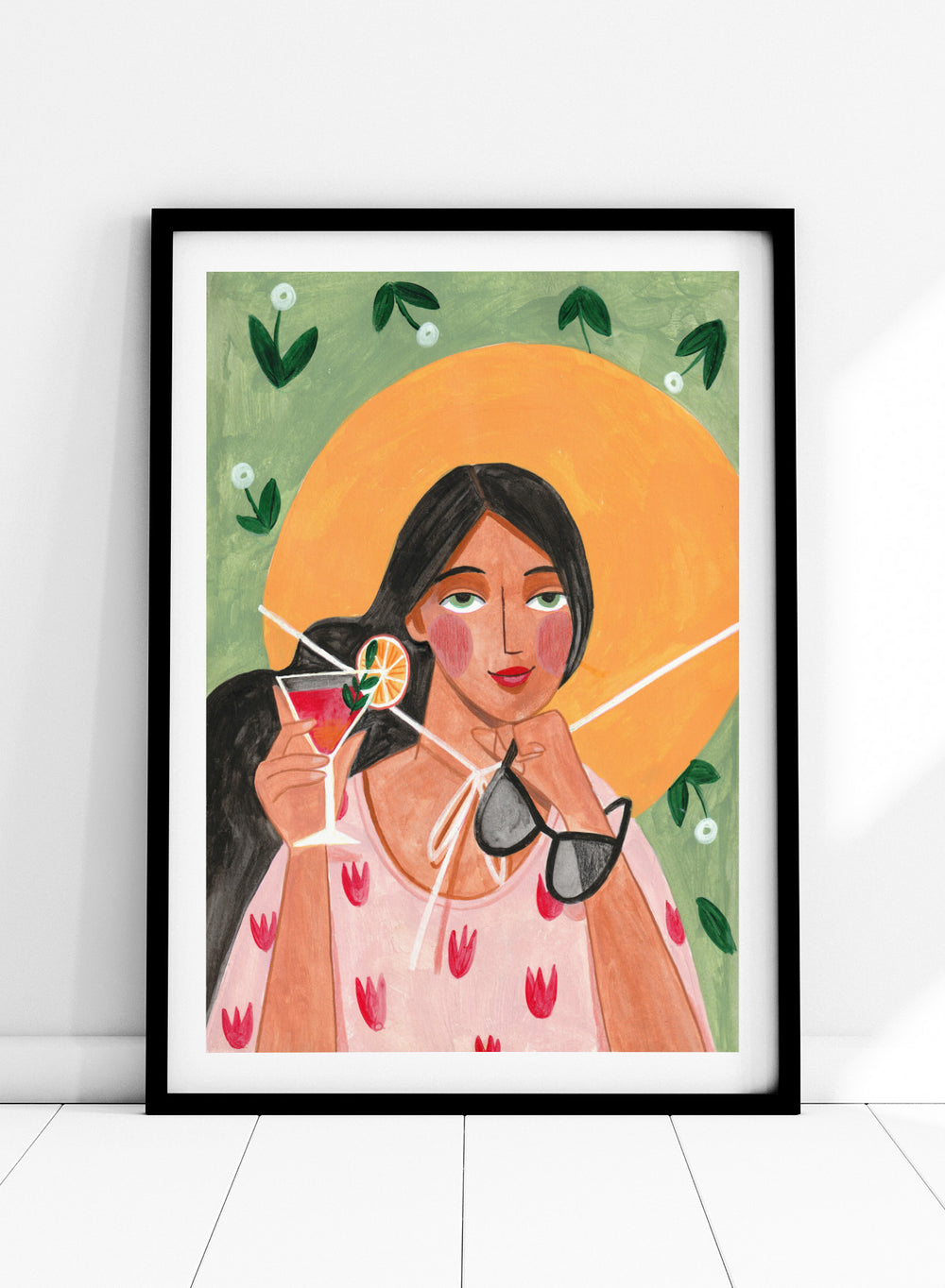 Illustration of a woman holding a cocktail and sunglasses with a sun and foliage background. Summer Woman Cocktail Hat by Caroline Bonne Müller is a fine art print and wall poster featuring a woman holding a cocktail with a bold yellow hat and bright summer colors.