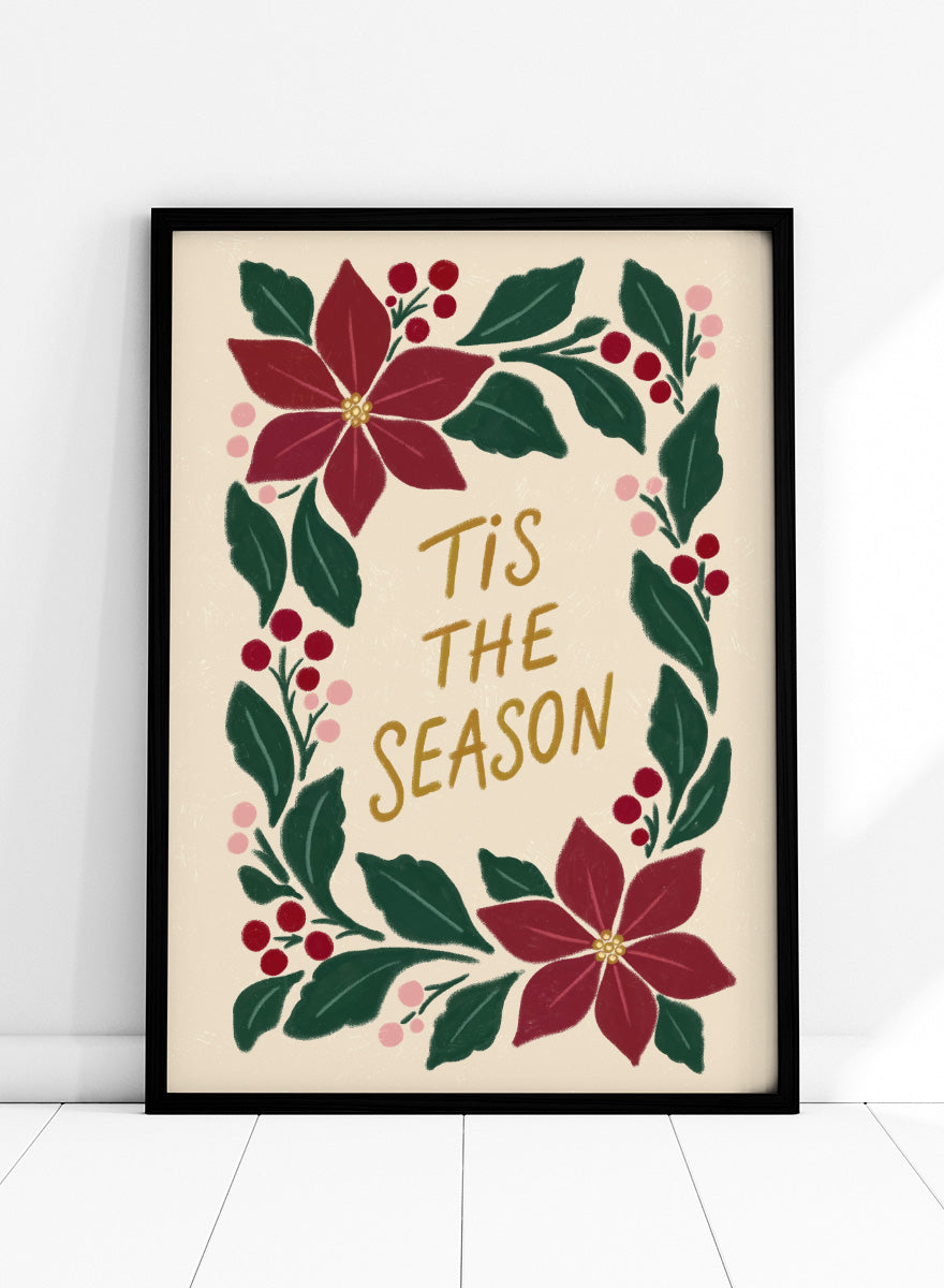Shop Tis The Season Wreath by Katarzyna Gąsiorowska, a Christmas wall art print poster featuring poinsettias, berries, greenery, and festive holiday lettering.