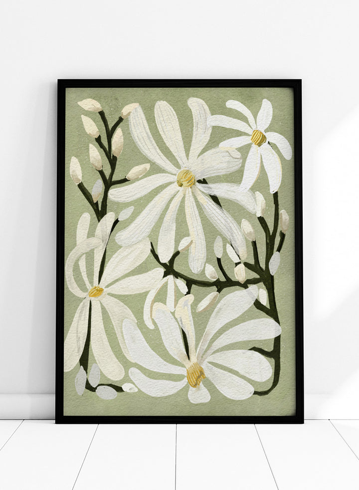 A botanical art print featuring white magnolia flowers with yellow centers and dark green stems on a muted sage green background. Shop Star Magnolia Floral Art Print by Katie O&