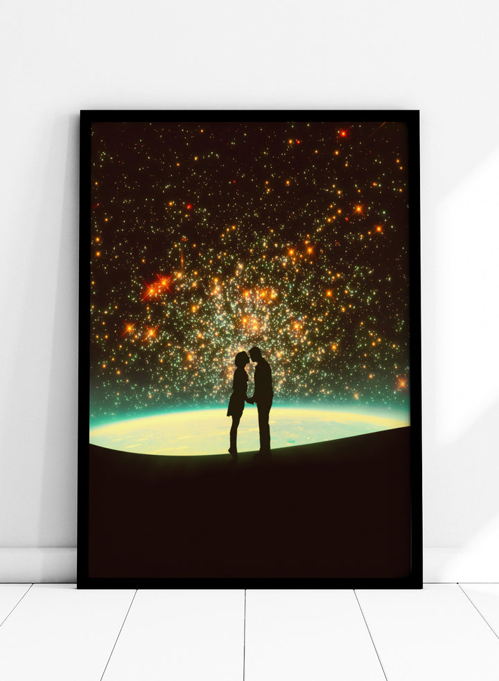 Silhouette of a couple against a starry night sky with Earth in the background. A Cosmic Kiss by Taudalpoi romantic couple silhouette art print with glowing stars and cosmic horizon surreal poster wall art.