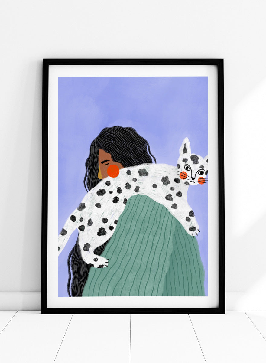 A framed art print featuring a stylized illustration of a woman with long black hair carrying a white cat with black spots over her shoulder, set against a lavender background. Woman and Spotted Cat by Bea Müller animal art print featuring a woman carrying a playful spotted cat, perfect for modern cat lover and pet decor.