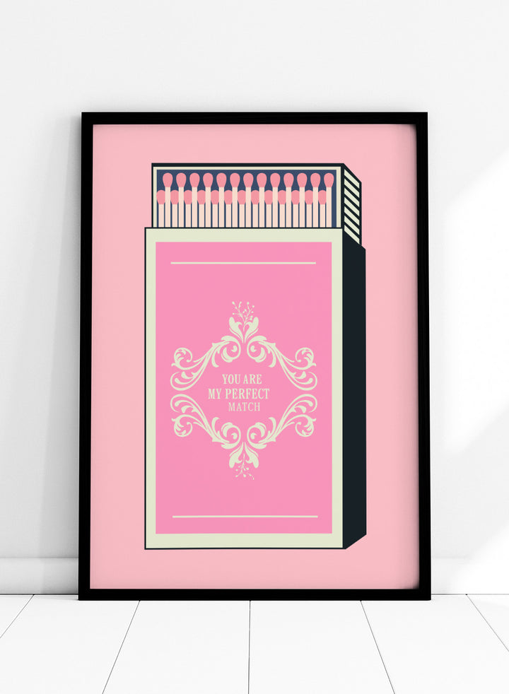 Matchbox with decorative design and text on a pink background. My Perfect Match by Andreas Magnusson is an officially licensed art print featuring a pink matchbox and playful typography. Modern graphic love poster.