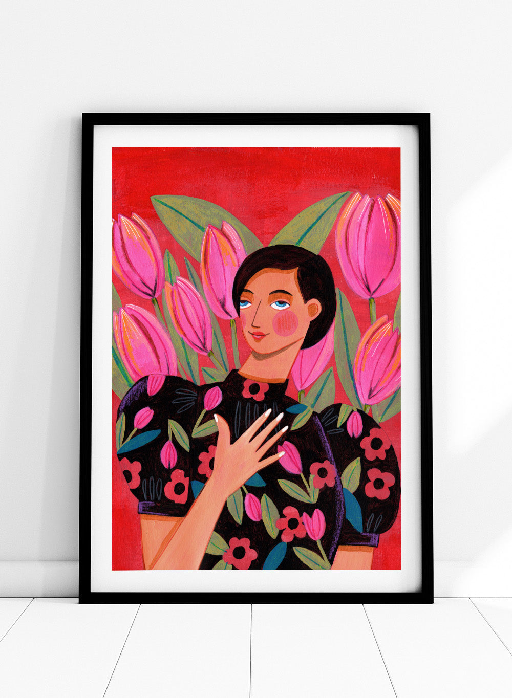 Illustration of a woman with floral dress and pink tulips on a red background. Woman portrait art print surrounded by pink tulips on a red background by Caroline Bonne Müller. Colorful floral illustration wall poster, officially licensed.