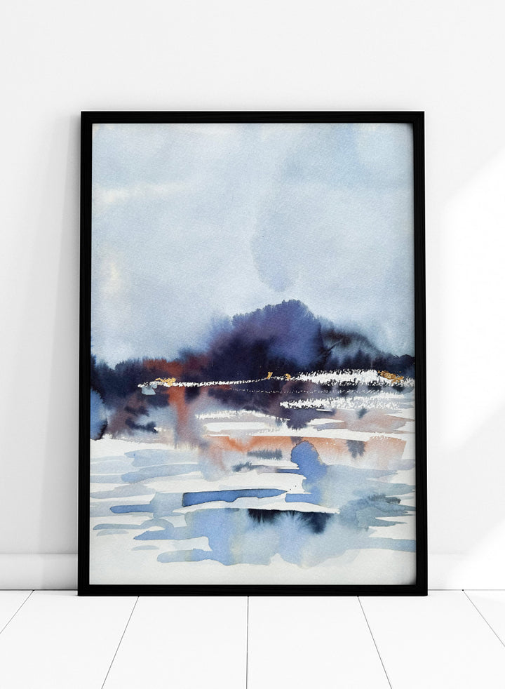 Shop Misty Mountain Lake by Helena Ryhle, a watercolor landscape wall art print poster featuring a misty lake, distant mountains, and atmospheric blue scenery.