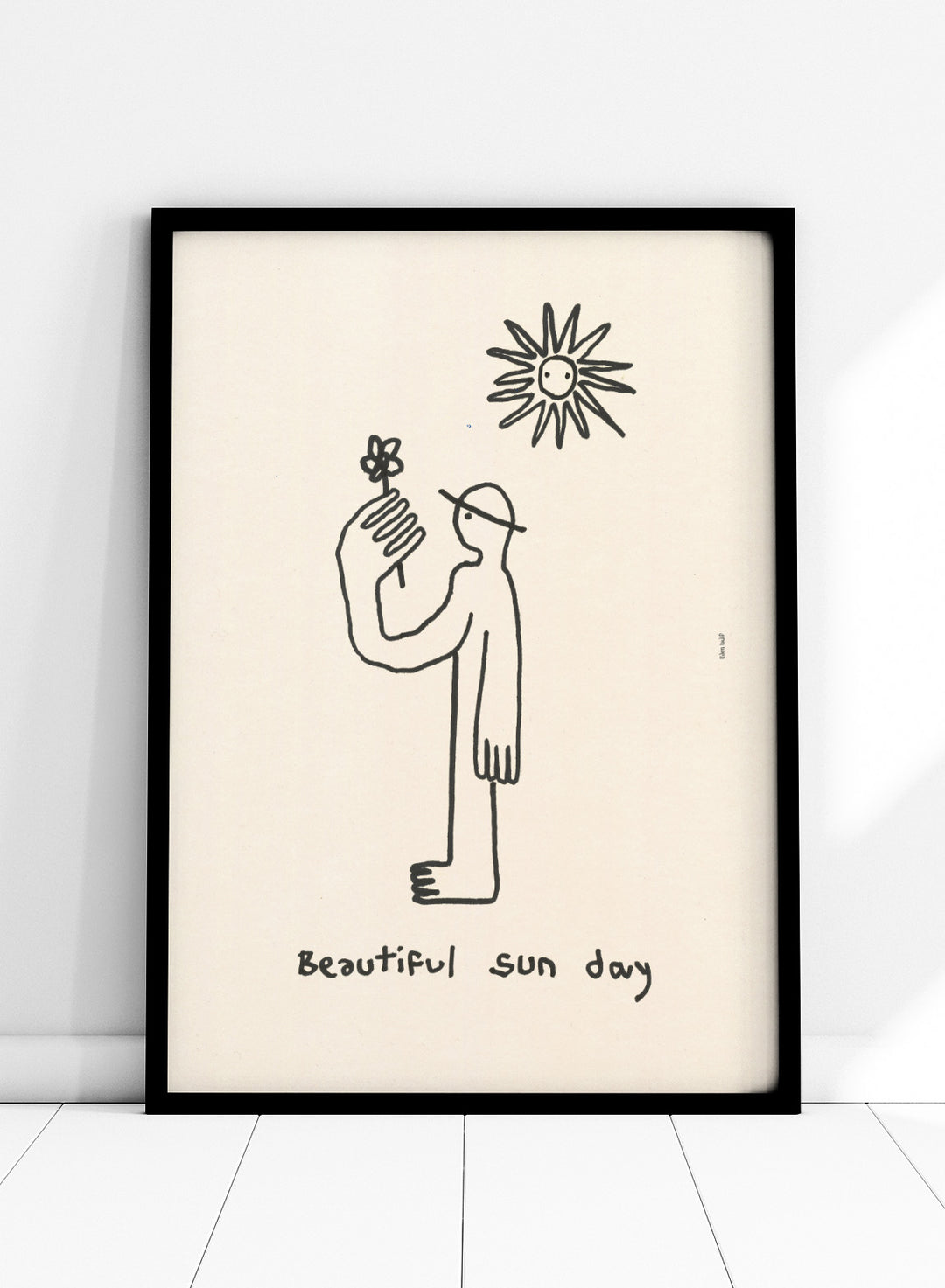 Black line drawing of a person with a flower and a sun, with 'Beautiful sun day' text on a beige background. Untitled by Eden Kalif is a modern line art print of a figure holding a flower under the sun, a contemporary minimalist wall poster with simple expressive drawing.
