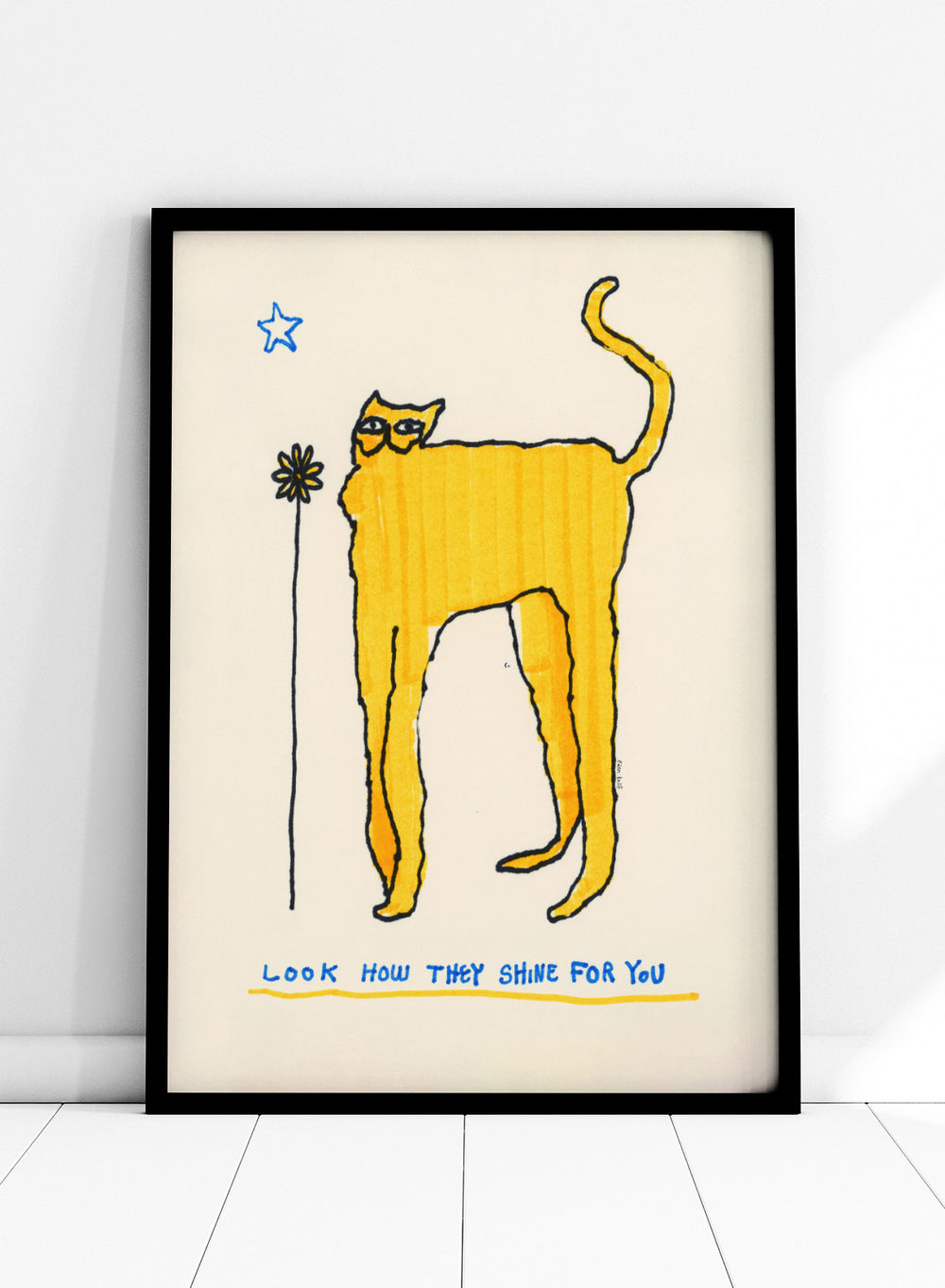 Yellow cat illustration with a flower and text on a beige background. Look How They Shine for You by Eden Kalif is a modern cat art print in yellow with text, a contemporary minimalist wall poster with playful form and expressive line work.
