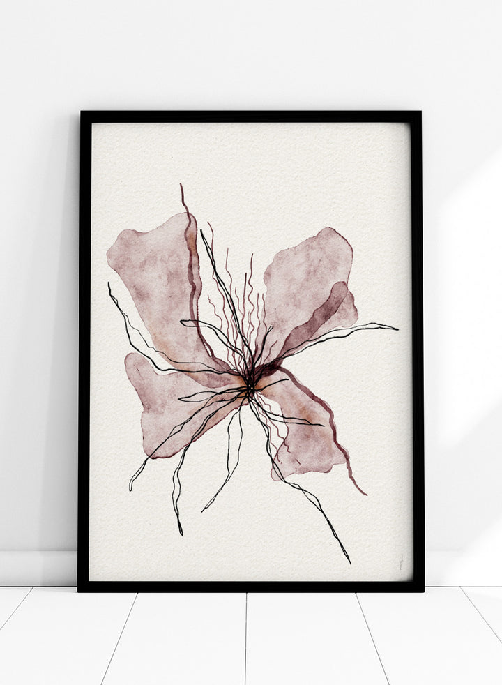 Framed artwork of a pink flower on a white wall. Booming Blooming by Ankie Kooi features an abstract flower illustration with soft watercolor petals and fine line details. Minimal botanical art print inspired by nature and growth.