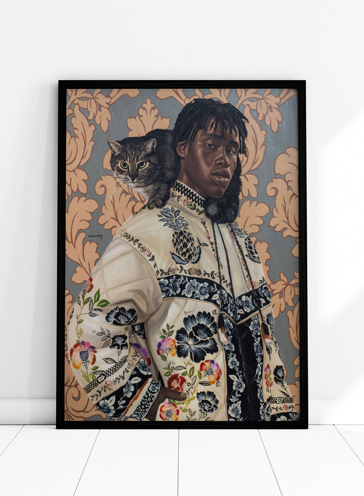 A stylized portrait painting of a Black man wearing an ornate cream jacket with colorful floral embroidery, seated against a patterned wallpaper background with a gray tabby cat on his shoulder. Shop Man and Cat Portrait by Damilare Jamiu, a contemporary figurative wall art print featuring a man with a cat, embroidered clothing, and rich floral detail.