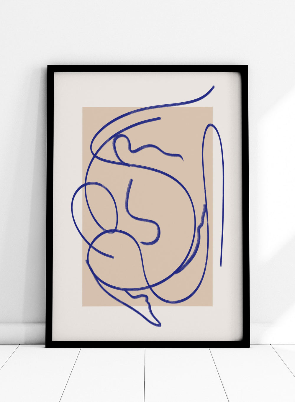 Abstract blue line art on a beige background. Abstract Fluid Line by Little Dean minimalist line art print featuring abstract female figure drawing, modern continuous line illustration wall art poster.