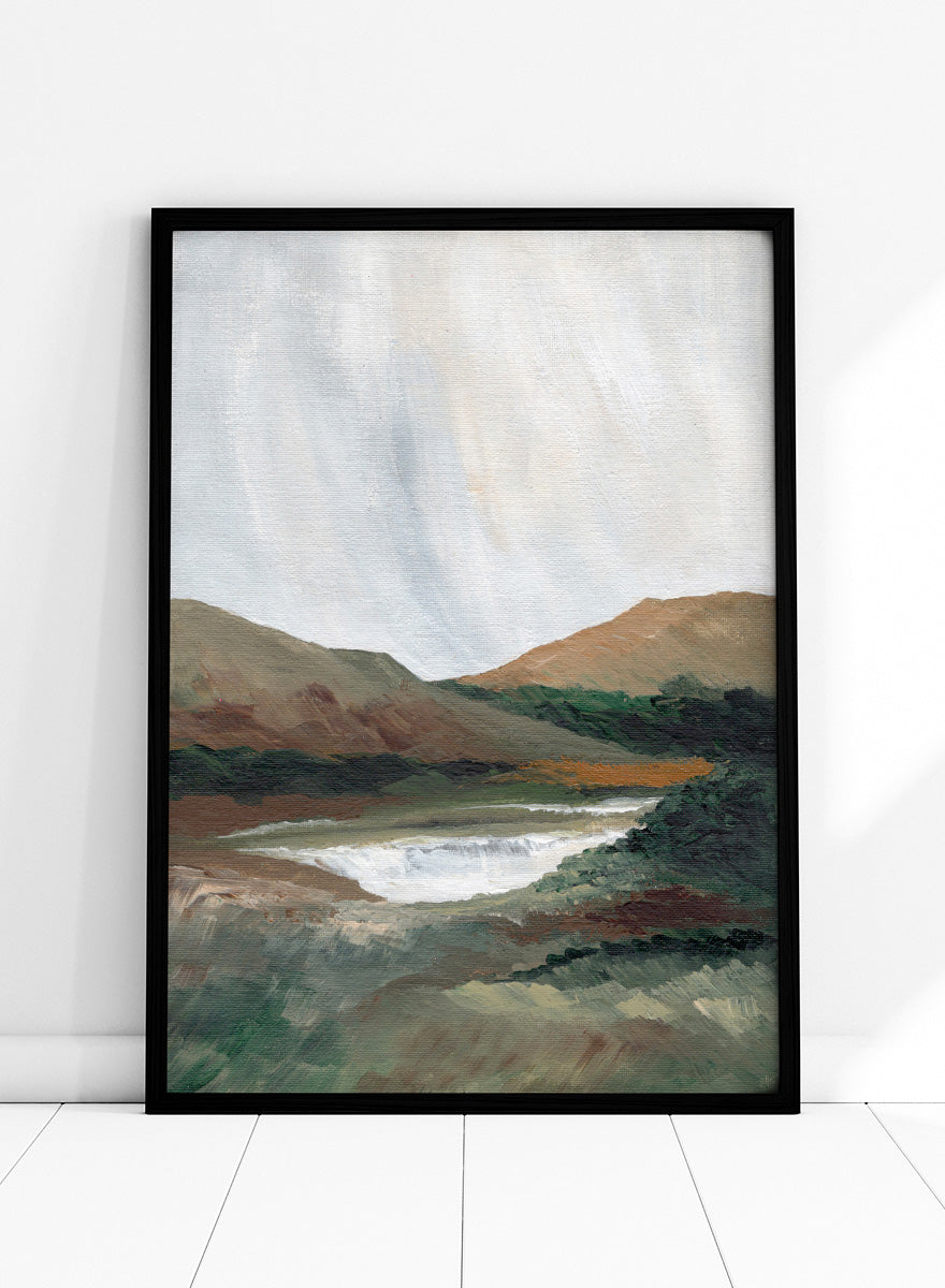 An impressionistic landscape painting of a river or waterfall flowing through a valley, with brown and green hills under a pale sky. Shop Serene Mountain Lake by Nikita Jariwala, a mountain landscape wall art print poster featuring a peaceful lake, wooded hills, and soft green tones.