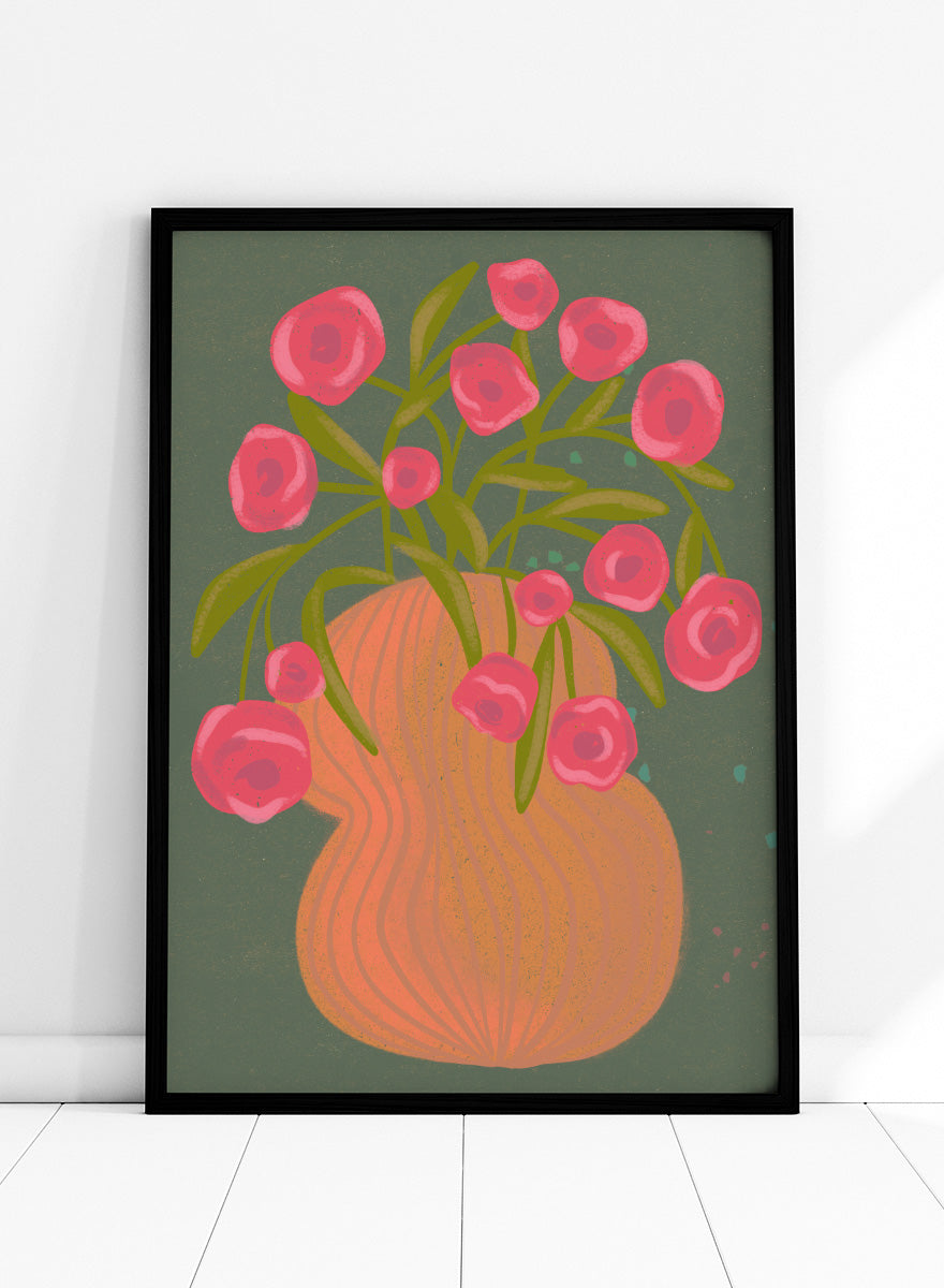 Shop Pink Flowers Orange Vase by Nikita Jariwala, a floral wall art print poster with bold pink blooms, an orange vase, olive stems, and deep green tones.