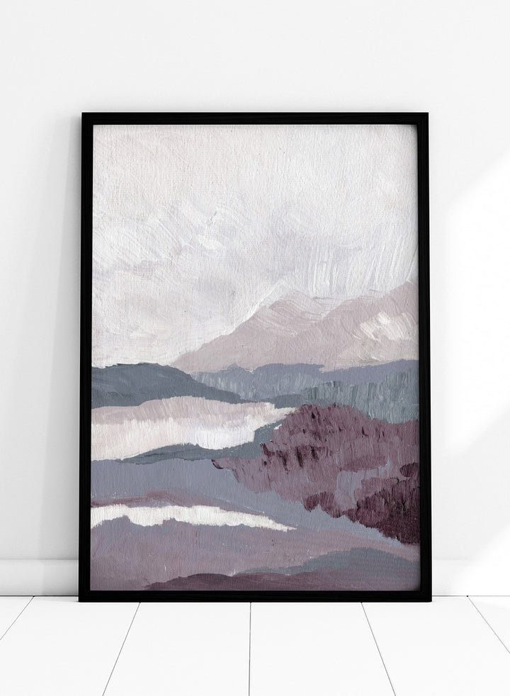 Shop Muted Mountain Layers by Nikita Jariwala, an abstract mountain landscape wall art print poster featuring layered peaks, misty scenery, and soft purple tones.