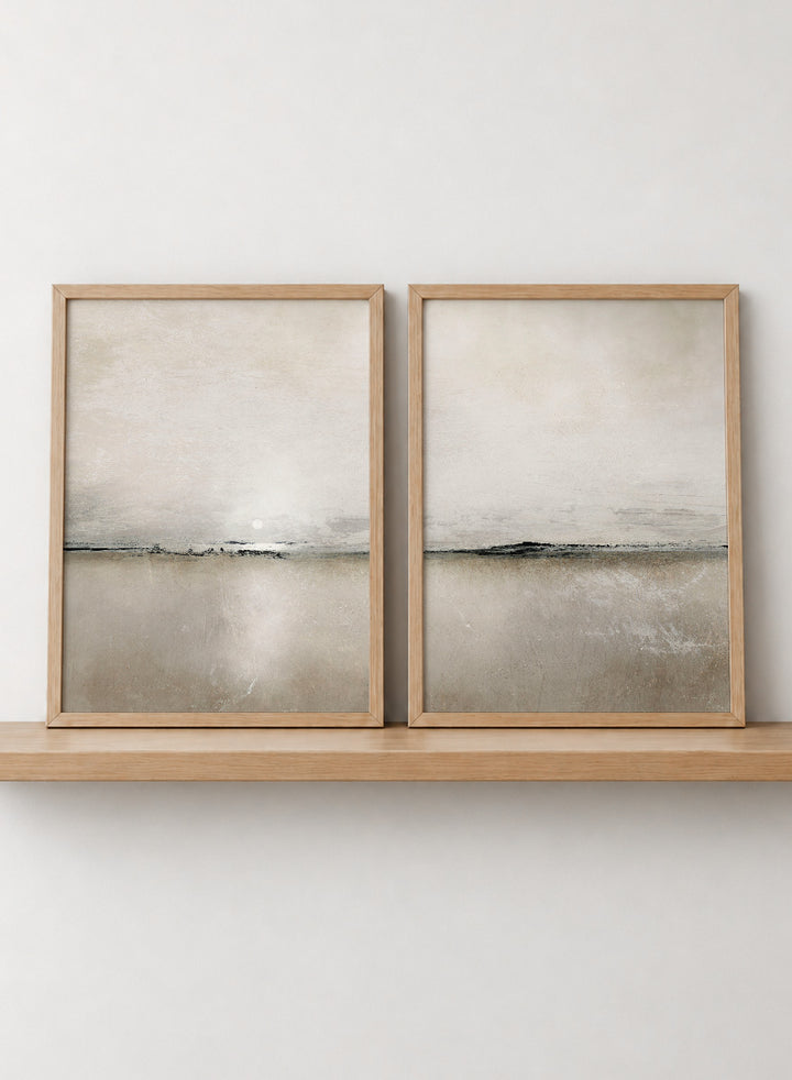 Shop Sunlight Bay by Dan Hobday, a set of 2 minimalist landscape wall art prints posters featuring a soft horizon, open water, and warm brown and cream tones.