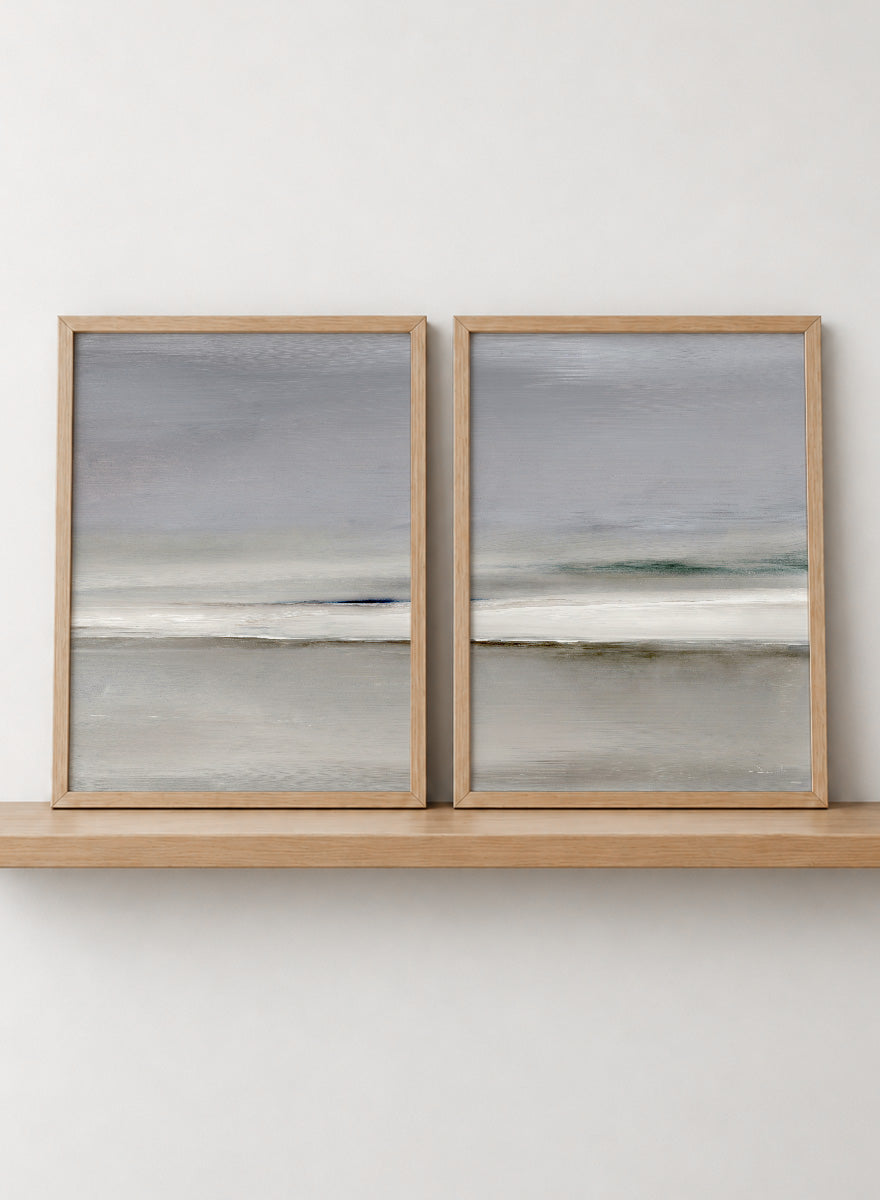 Shop Horizon by Dan Hobday, a set of 2 minimalist landscape wall art prints posters featuring soft gray seascapes, open water, and a quiet horizon.