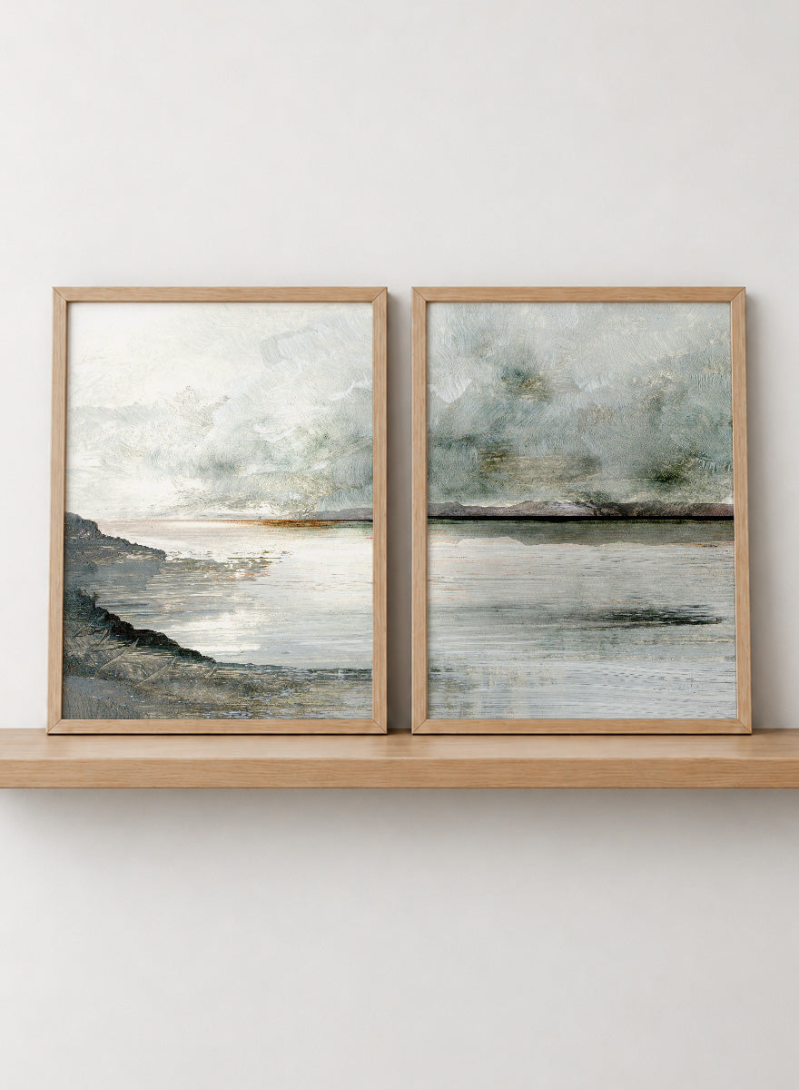 Shop Still Coast by Dan Hobday, a set of 2 coastal landscape wall art prints posters featuring misty water, rocky shoreline, and soft gray and green tones.