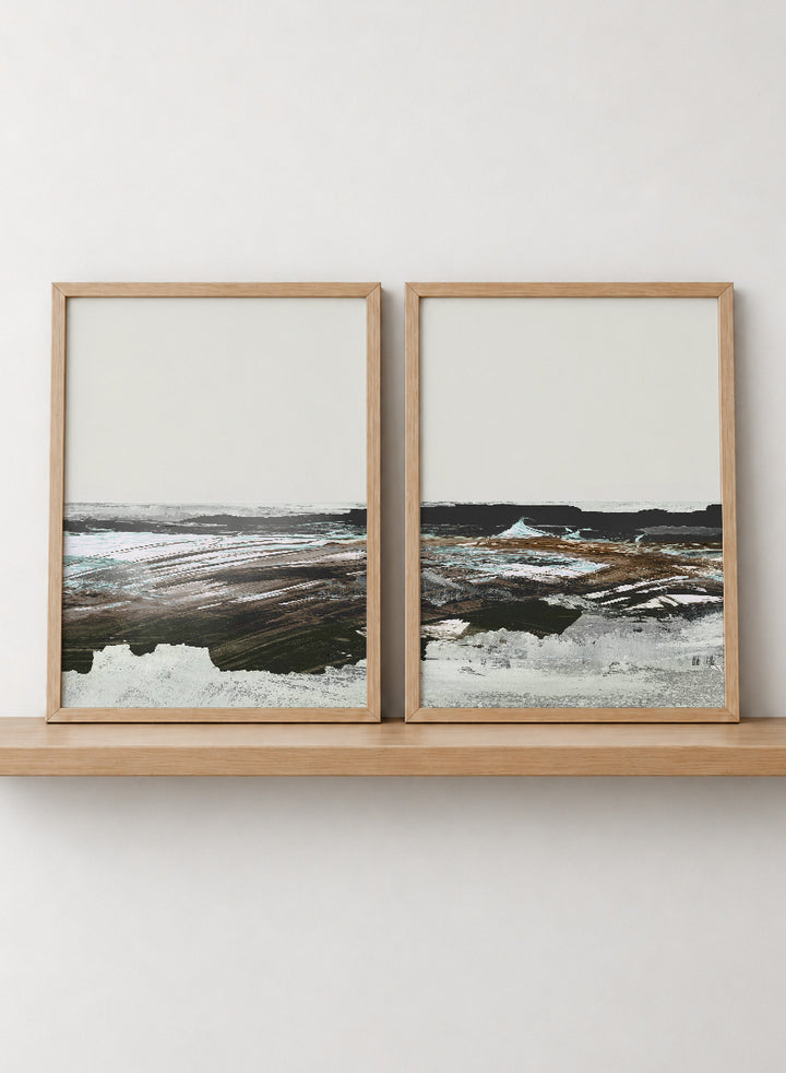 Shop Constantine Bay by Dan Hobday, a set of 2 coastal landscape wall art prints posters featuring windswept shoreline, surf, and muted blue-brown tones.